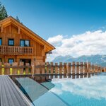 Photo of Luxury pool chalet Dachsteinblick